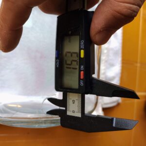 measuring the diameter of the vertical width of the hole